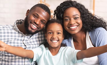 Happy family, mum dad and child