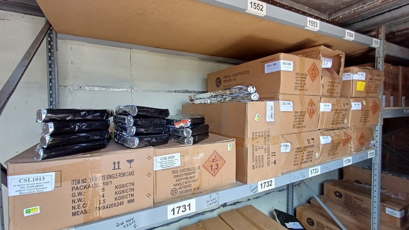 Unpackaged fireworks inside container two