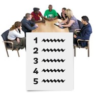 People having a meeting round a table