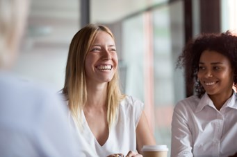 Two women smiling