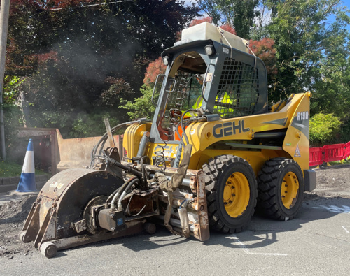 Photo of a Bobcat machine on a sunny street