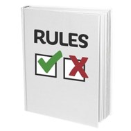Rule book with tick and cross on it