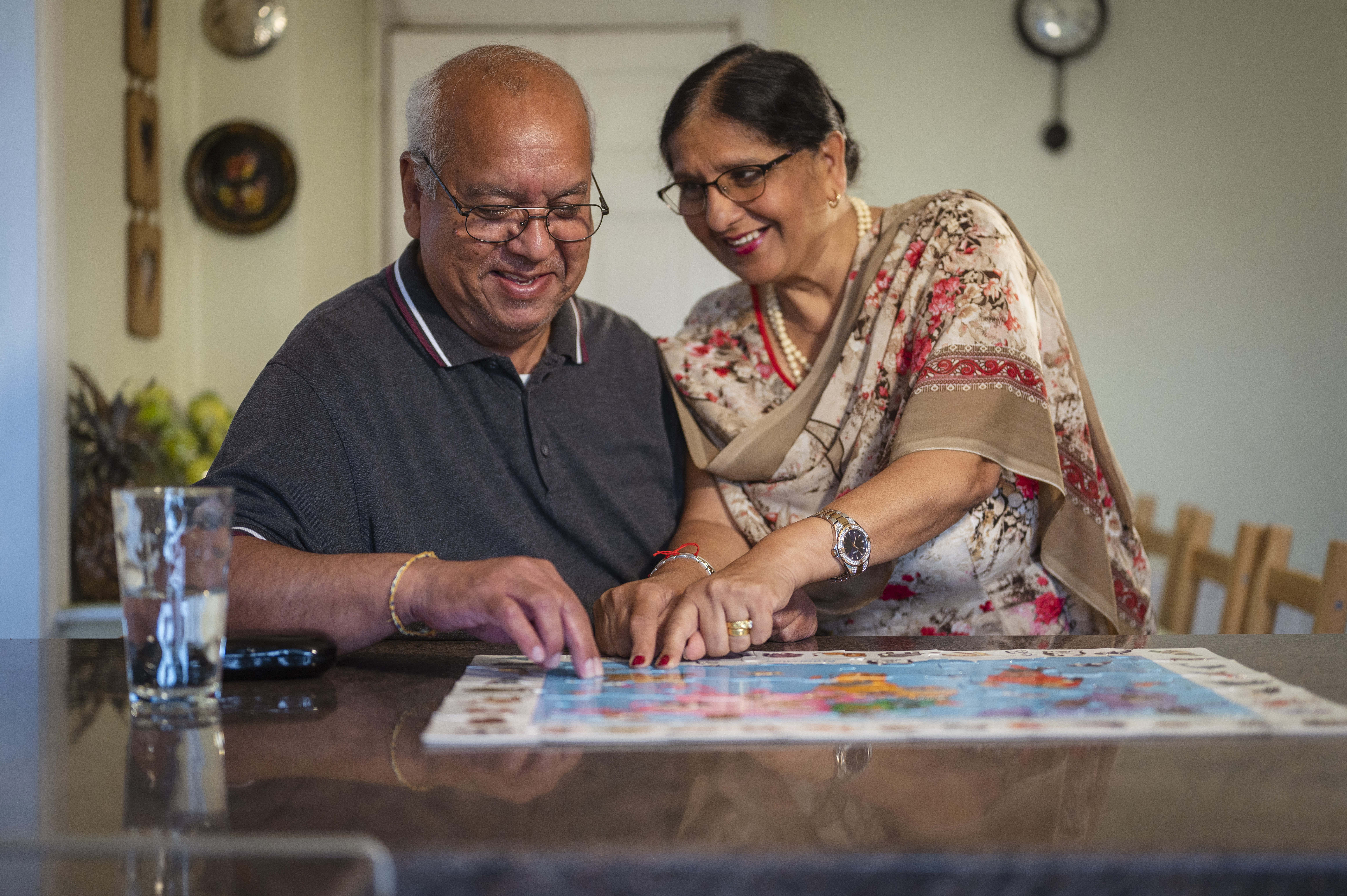 two seniors doing a jigsaw