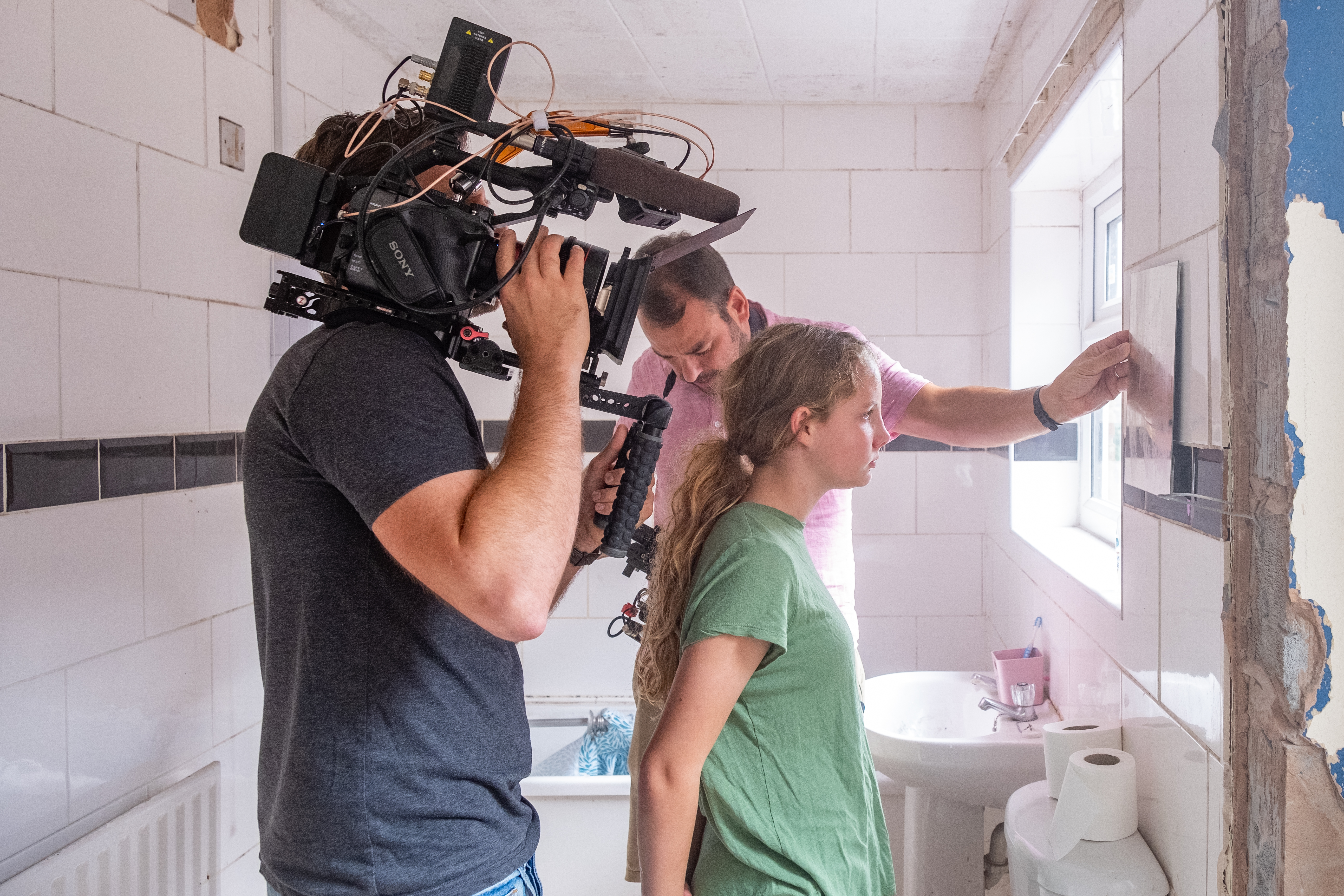 young girl being filmed for fostering video