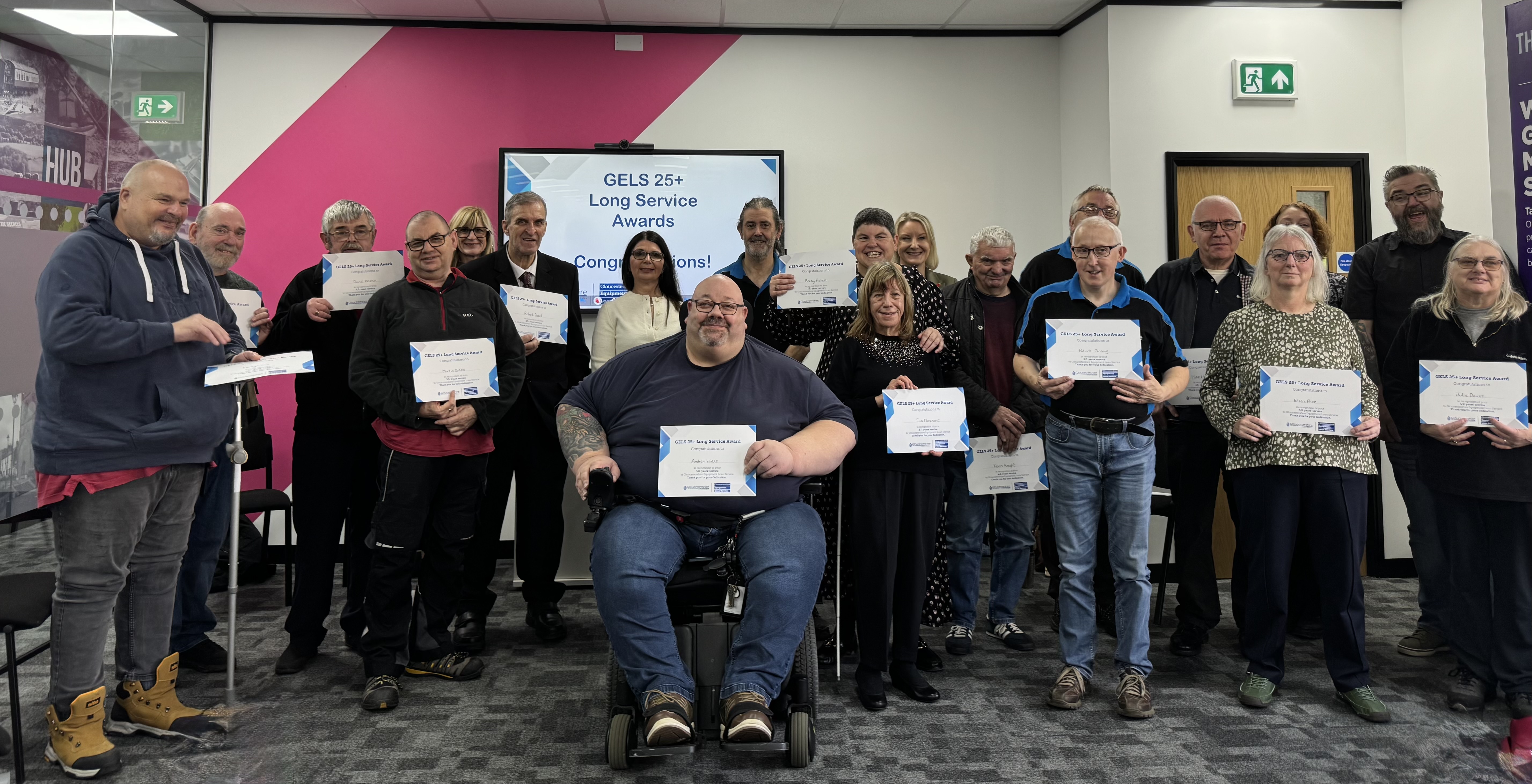 Colleagues with their certificates