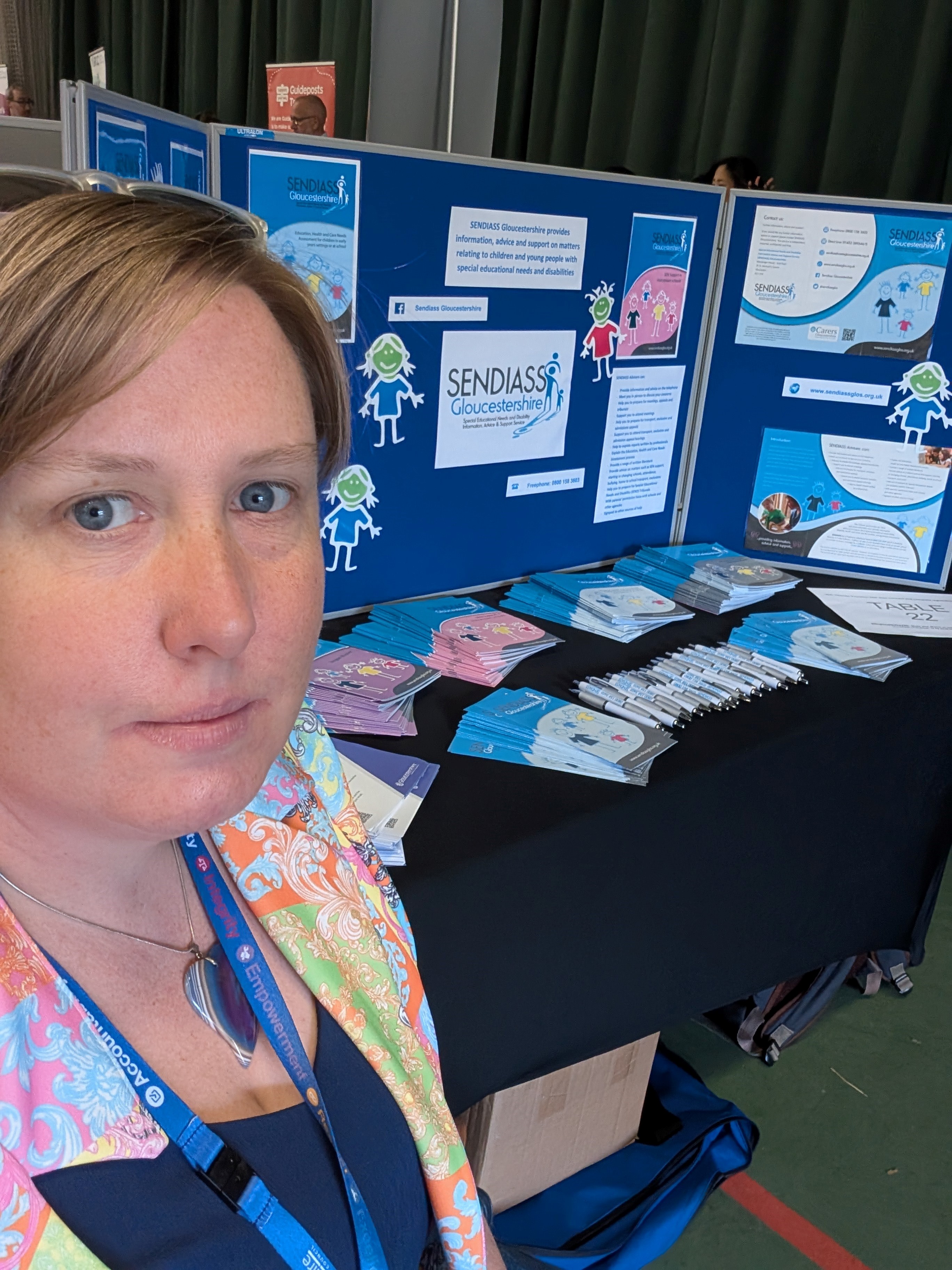 Picture of Cat from SENDIASS in a colourful jacket on the SENDIASS stand at the Big Heath Day 2025